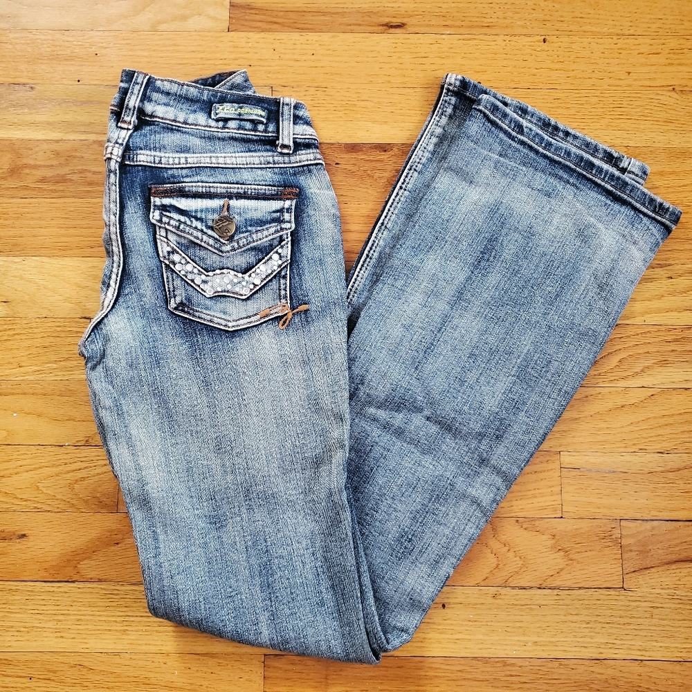 Flare jeans with studs.